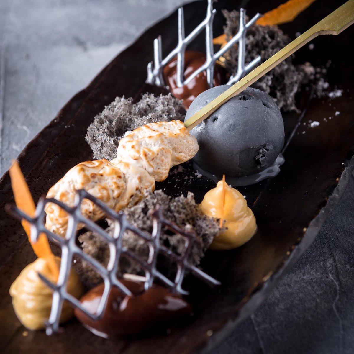 Sticky Mango (@stickymangoldn) on Twitter photo They say #Indonesia is the land of 1000 Satay recipes! <a href="/stickymangoldn/">Sticky Mango</a> have made it 1001 with a special dessert as part of our limited time 11 course tasting menu. Everything about Satay in sweet form. Grilled peanut nougat Satay,Chocolate Ganache,Charcoal Ice Cream, Chilli Tuile They say #Indonesia is the land of 1000 Satay recipes! <a href="/stickymangoldn/">Sticky Mango</a> have made it 1001 with a special dessert as part of our limited time 11 course tasting menu. Everything about Satay in sweet form. Grilled peanut nougat Satay,Chocolate Ganache,Charcoal Ice Cream, Chilli Tuile