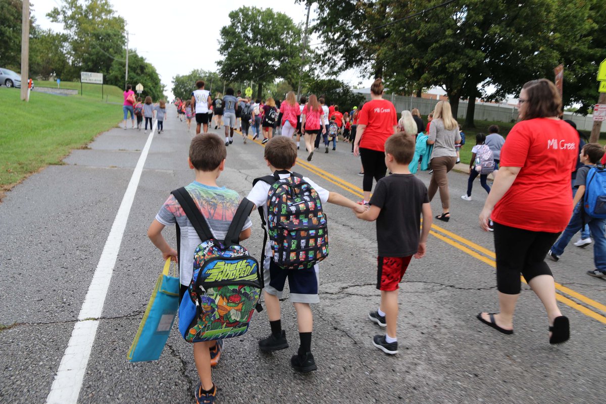 ISDSchools's tweet photo. @Mill_Creek_ISD students, parents and teachers joined together for National Walk to School Day this morning! @ChrismanBears @ipdinfo and @CityOfIndepMO firefighters helped welcome students to school. What a special day! #isdstrong https://t.co/yizmNcr36W