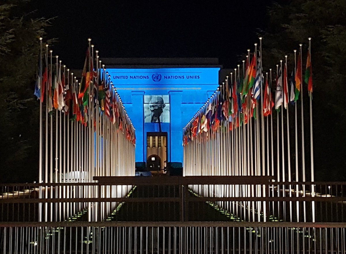 UNGeneva's tweet photo. Tonight: Palais des Nations illuminated with images of Mahatma #Gandhi on the occasion of the 150th anniversary of his birth and the International Day of Non-Violence.
#peace #GandhiAt150 https://t.co/PB92zok4fi