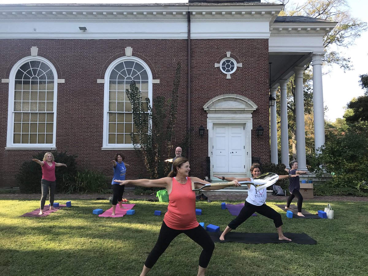 PennCharter's tweet photo. #HowFarPC does wellness extend at Penn Charter? To everyone! The shovel has made its way to Tuesday afternoon yoga class for faculty and staff! The new #PCAWC will have space for yoga and meditation (though sunny afternoons make us want to #namaste outside). #PCBreaksGround https://t.co/dRtnBxEmaO