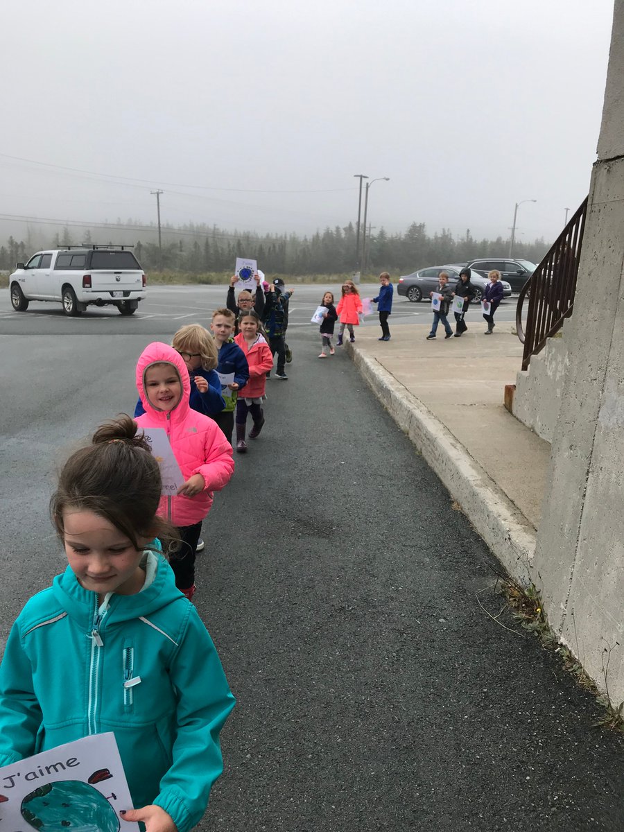 Madame_French's tweet photo. A few snaps from the school #climatechangerally this past Friday! These little learners are the future. 🌎 https://t.co/Jcvzgj4Dr0