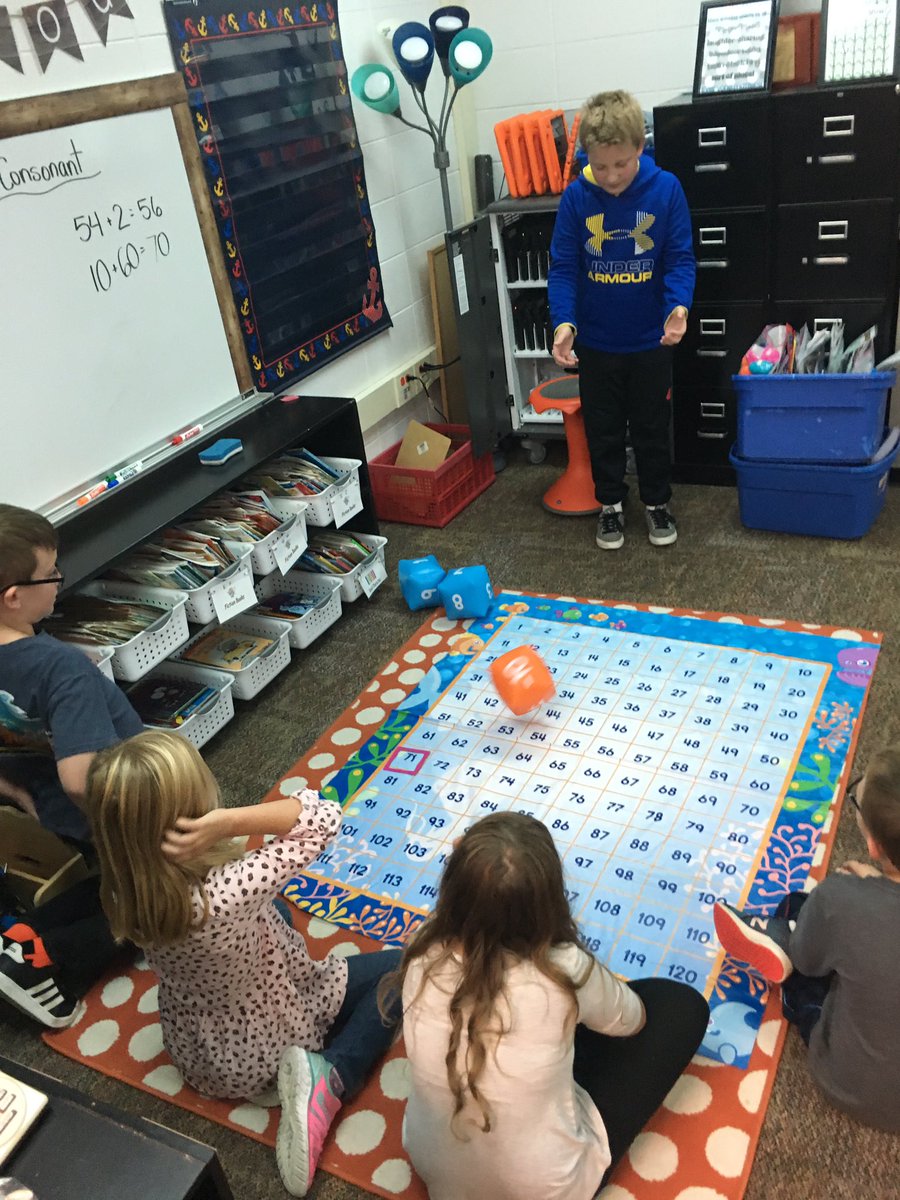 TomlinsonMary14's tweet photo. When you learn how to use the 100 chart to add double digits, you use the blow up dice and the floor mat! #movinginmath #viewourstory #enjoytheview #thirdistheword @VV_Voyagers https://t.co/jsgobFMH7t
