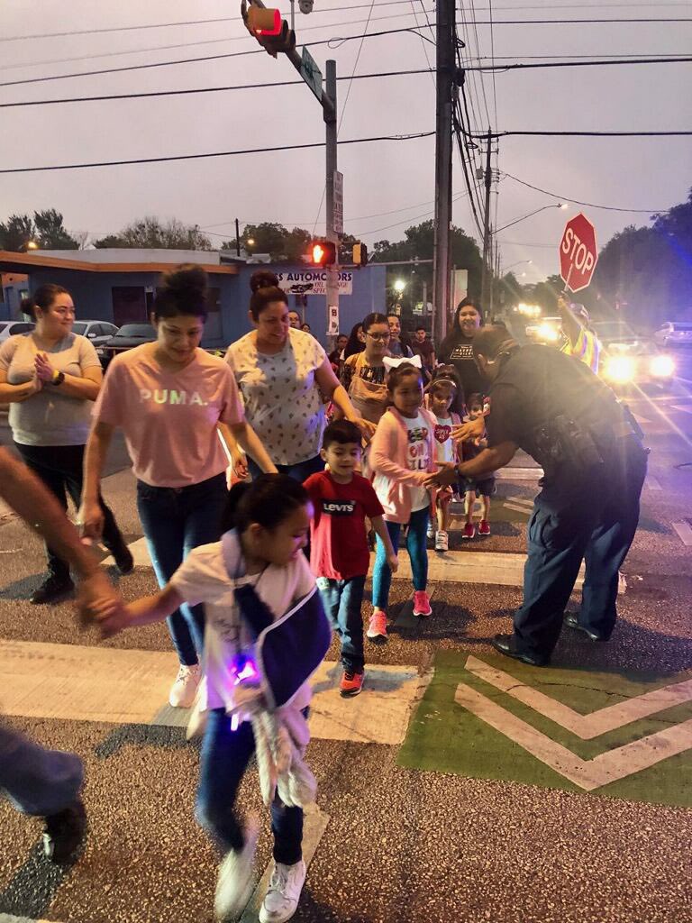 This morning Officer Reynaga participated in National Walk to School Day with students from St Elmo ES helping them cross busy intersections from the Sierra Vista apartments!  #educationalpolicing #policingwithapurpose #AISDGameChanger #weareAISD