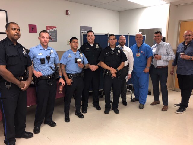 TempleHealth's tweet photo. Temple University Hospital Emergency Department staff and @TU_Police celebrating National #CoffeeWithACop Day https://t.co/D3a2crFe3o
