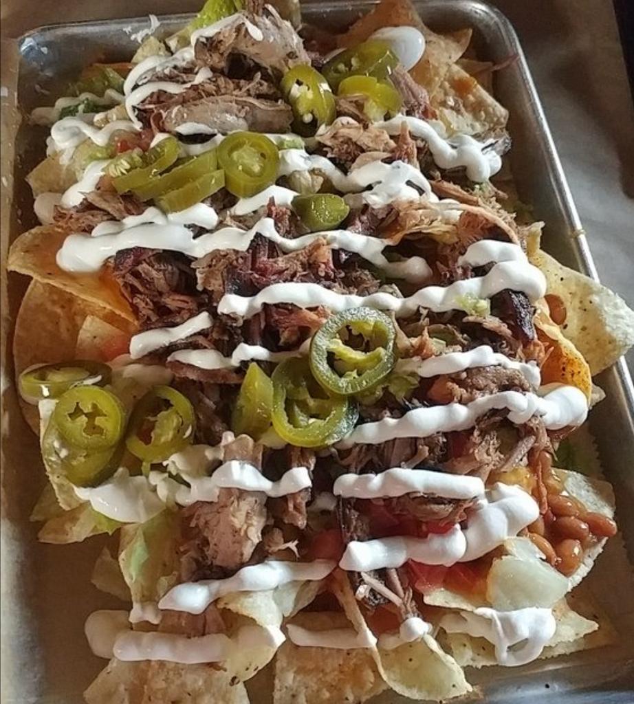 Picasso couldn't have painted a better picture of BBQ Pulled Pork Nachos