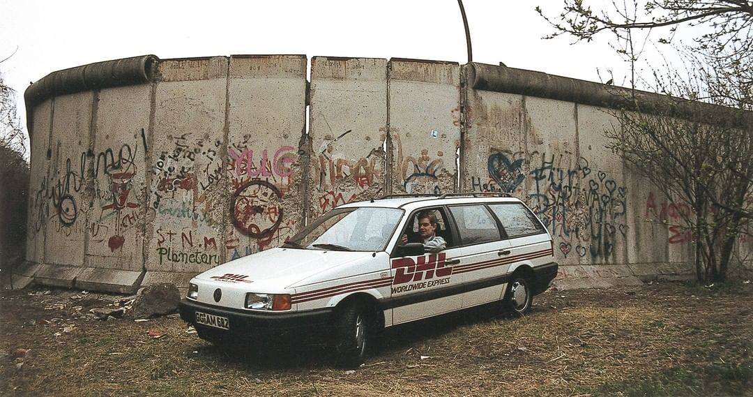 DeutschePostDHL's tweet photo. Did you know that after the fall of the Berlin Wall, #DHL shipped fragments of the wall to collectors all over the world? The fall of the wall also led to the reunification of West and East Germany in 1990. Happy #GermanUnityDay! https://t.co/VxaNvCZzUA
