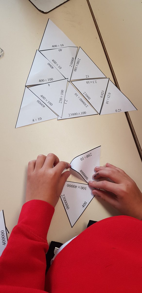 MsBowderyCTS's tweet photo. Using our knowledge of multiplying and dividing by 10 100 1000 to solve the number puzzle pyramid. We used a place value chart to help us with the jumps. Super team work year 5! @CTS1_Watford @MissWCTS1 #CTMaths https://t.co/WE4T4CHe8E