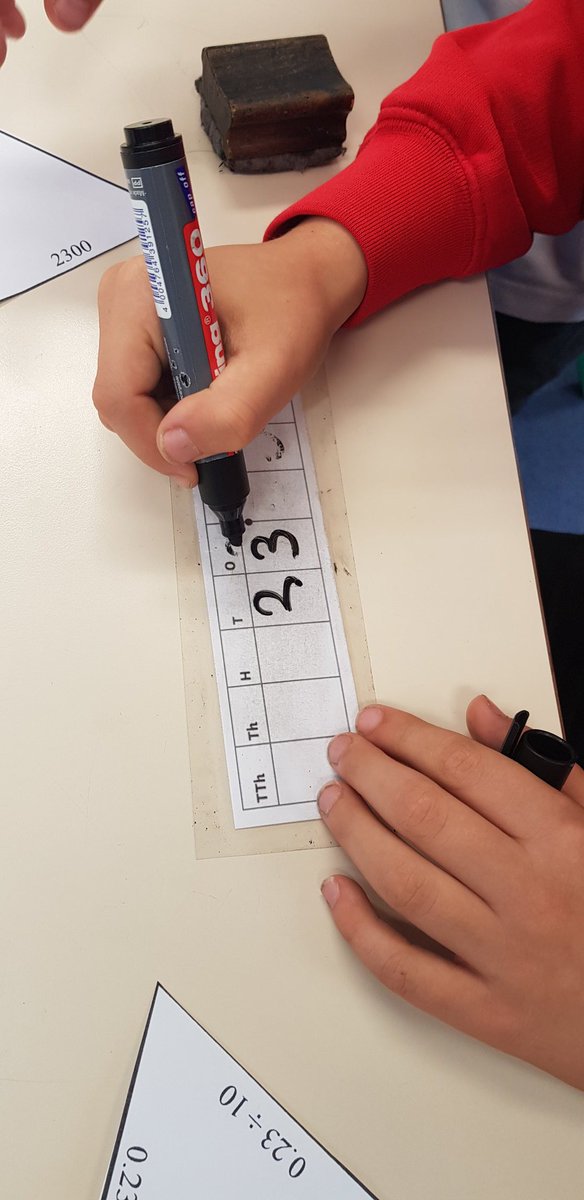 MsBowderyCTS's tweet photo. Using our knowledge of multiplying and dividing by 10 100 1000 to solve the number puzzle pyramid. We used a place value chart to help us with the jumps. Super team work year 5! @CTS1_Watford @MissWCTS1 #CTMaths https://t.co/WE4T4CHe8E