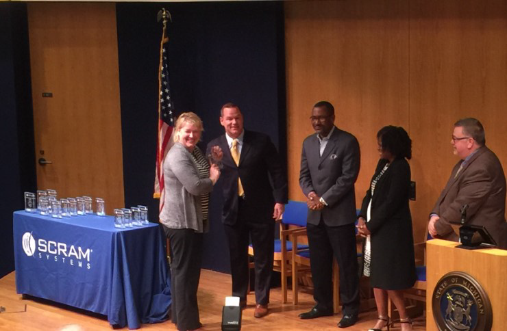 Probation Agent Shelley Yambrick receives an award of Excellence in SCRAM alcohol monitoring. Congratulations and thank you for your excellent service!