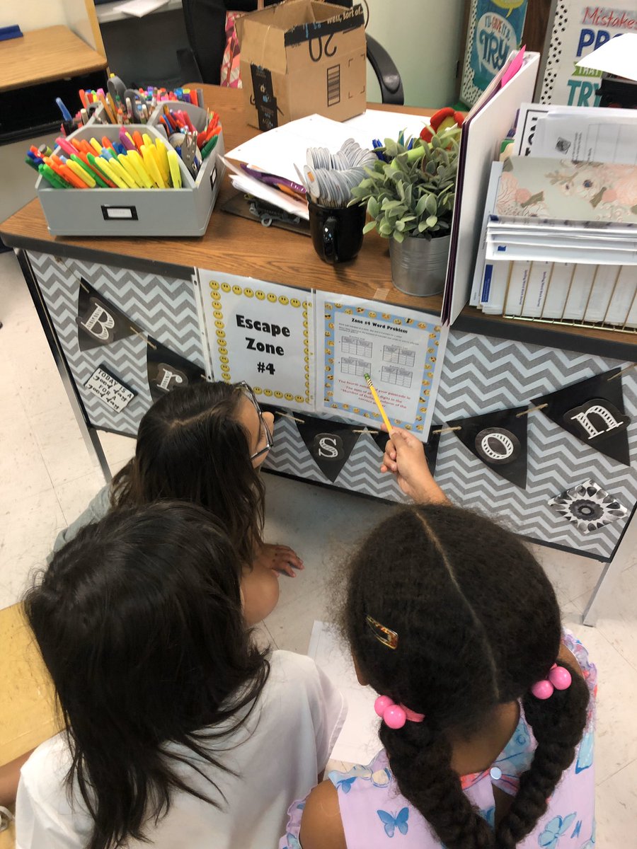 3rd grade students doing a addition/subtraction word problems for Escape Room to prepare for Monday!