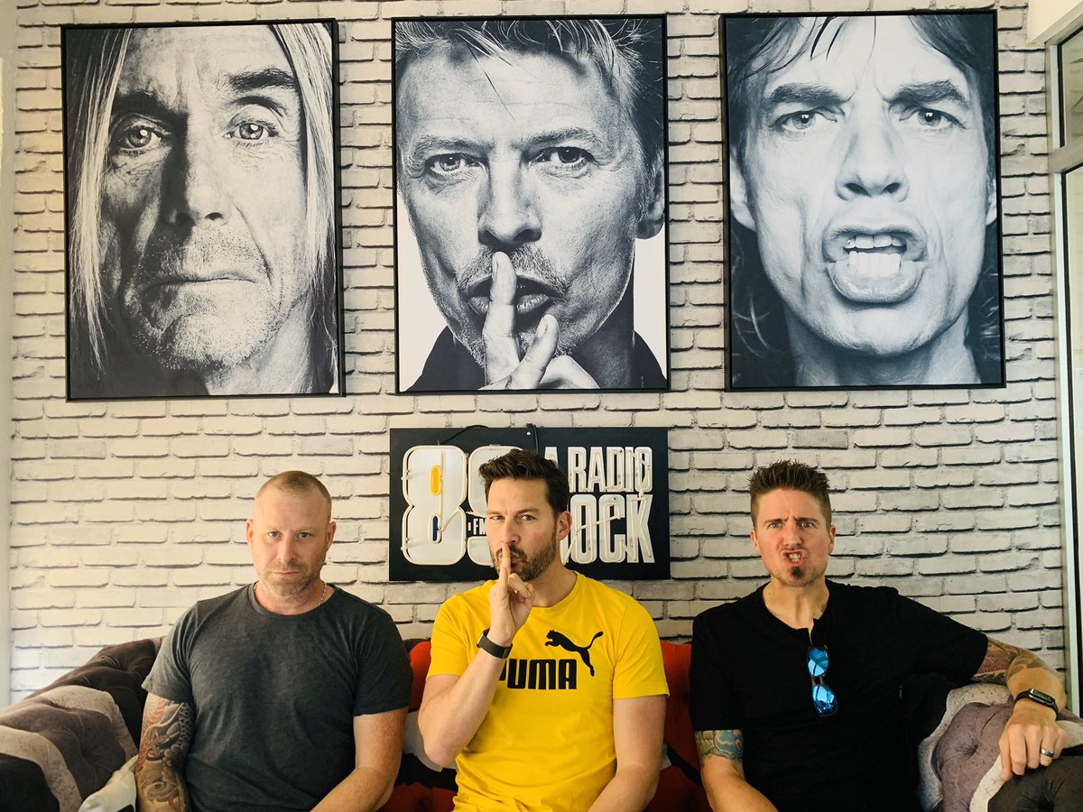 Nickelback's tweet photo. Mike, Ryan &amp; Daniel are about to take the air in Sao Paolo on @89aradiowebrock 
Currently working on some pre interview portraits... https://t.co/zfkMPxoarw
