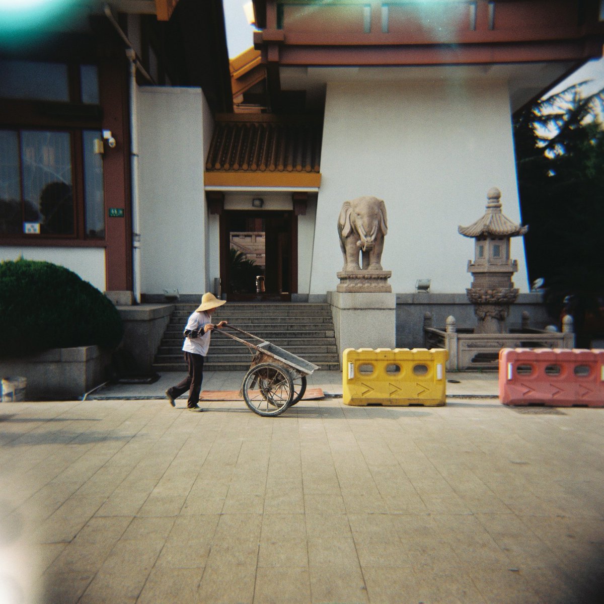 @Littlest_Holga Right, time to add some colour up in here. Here's what the @Littlest_Holga painted for me on some #lomography 100 at my local temple. #believeinfilm #holgaweek innit