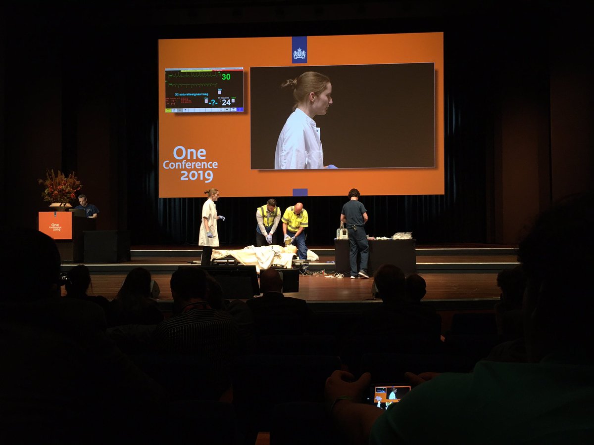 jjdew's tweet photo. Life on stage at the #OneConferenceNL : a medical procedure under cyber attack  #NLCyber the doctor is real and not informed about the simulation very brave! https://t.co/3c2QjB3SiP