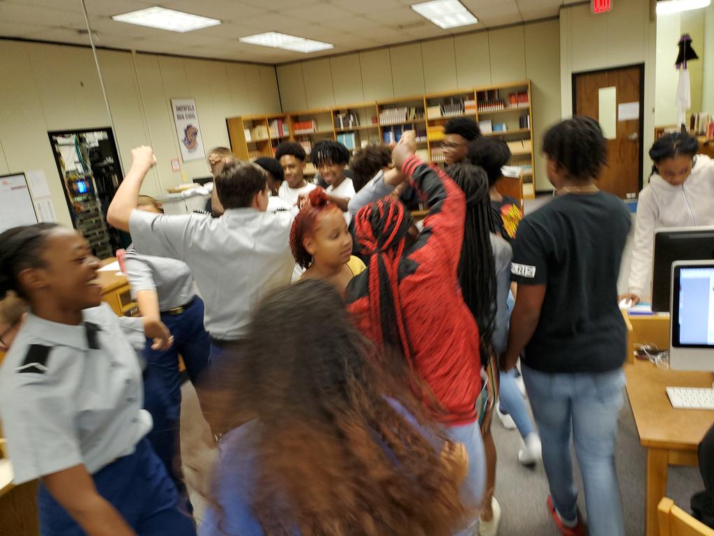 Give_Me_A_Sine's tweet photo. #Packerblock took a field trip to the #SHSLibrary to see @HattieGarrow, Ms Clark and the #PositivityPeople today! https://t.co/AL7nUibzhJ