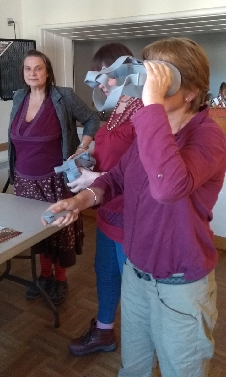 Participants in the ‘Soil Matters: Keeping Tarland’s soils healthy and productive’ panel discussion, at the Tarland Food and Music Festival, viewing the <a href="/JamesHuttonInst/">James Hutton Institute</a>  360 #VR film ‘Peatland Restoration: "Reducing emissions in a warming world’