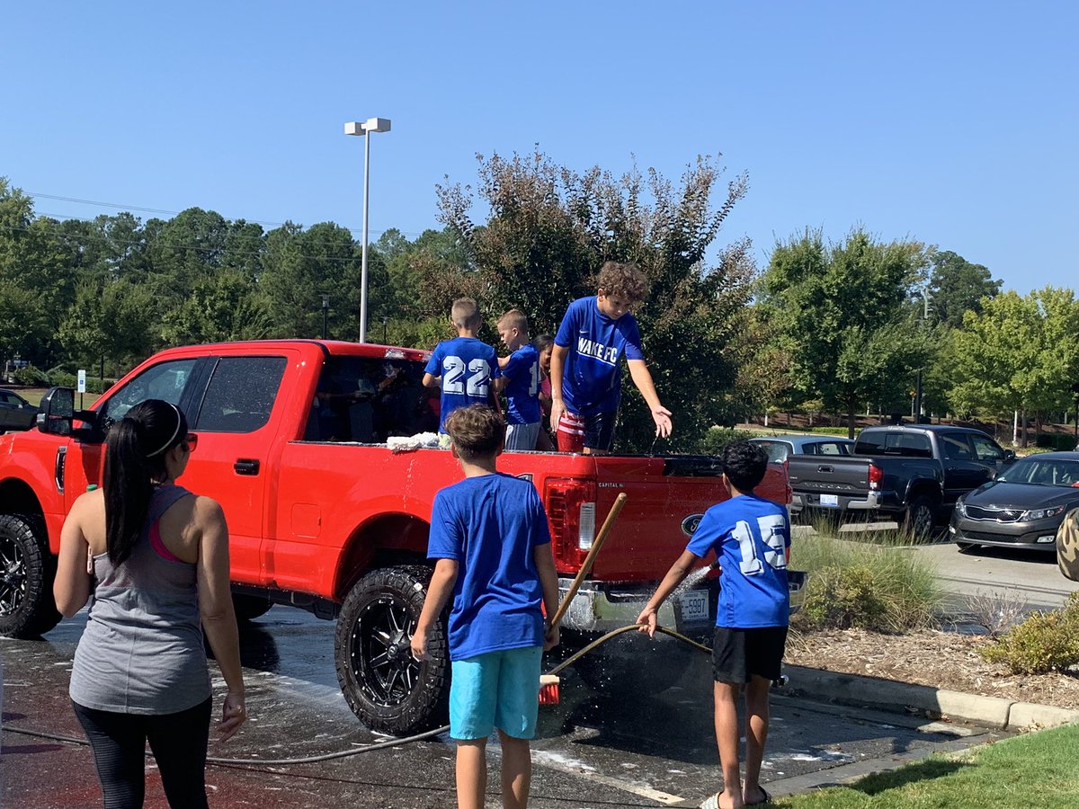 Kristi_Chestnut's tweet photo. A fun day of fundraising with our @WakeFC team! A HUGE thanks to Phil at @majesticcarcare for donating tons of great car wash supplies and to @Zaxbys for having us! We had a great time. Love our Holly Springs community! Thanks for your support. https://t.co/BTXYNlzG7z