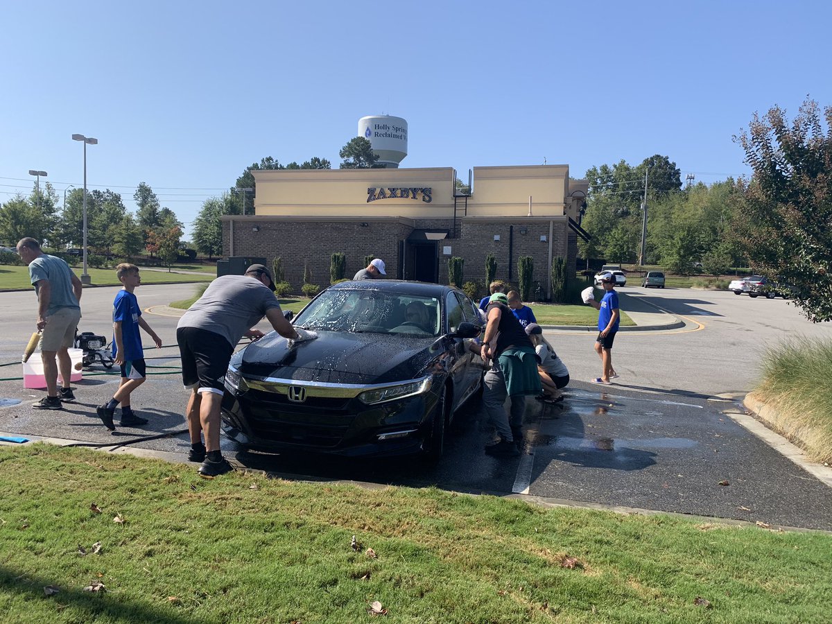 Kristi_Chestnut's tweet photo. A fun day of fundraising with our @WakeFC team! A HUGE thanks to Phil at @majesticcarcare for donating tons of great car wash supplies and to @Zaxbys for having us! We had a great time. Love our Holly Springs community! Thanks for your support. https://t.co/BTXYNlzG7z