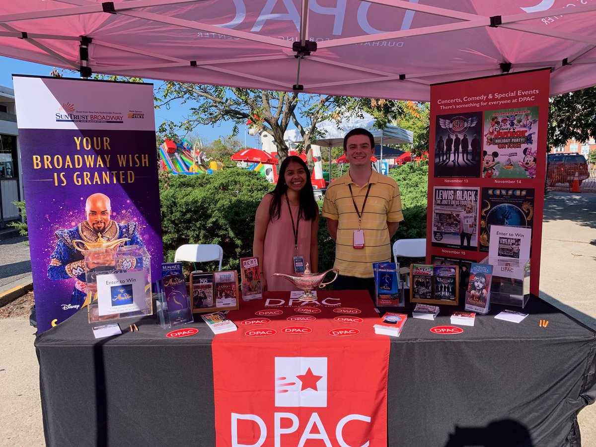 DPAC's tweet photo. Come see us at Centerfest today! We are right out front of the Durham Arts Council. We have complimentary posters, ticket giveaways, and a fun photo opp with the Genie’s magic lamp! #Centerfest https://t.co/8Zx5c3FLRL