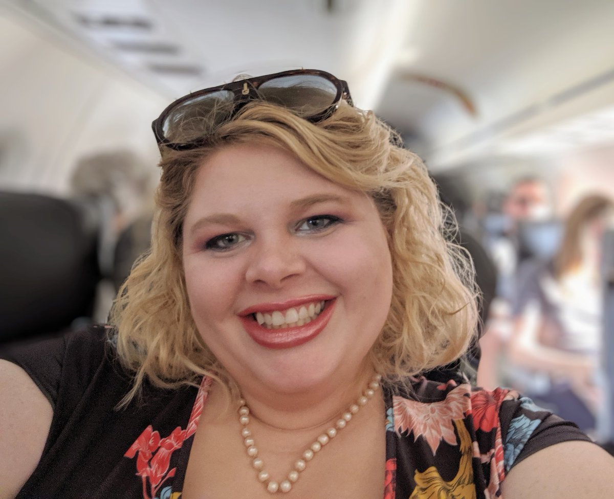 DoesitPew's tweet photo. Bye #DevfestSGF and @jordangee!
Yes, I am that girl wearing a cocktail dress π on a plane βοΈ because I am heading to a wedding π after. https://t.co/BwFppHz3RY