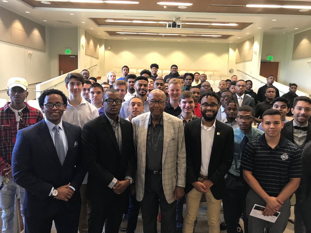 Mr Robert Brown, Keynote Speaker at SMI Retreat “You Can’t Go Wrong Doing Right.” Poses for photo with our students.