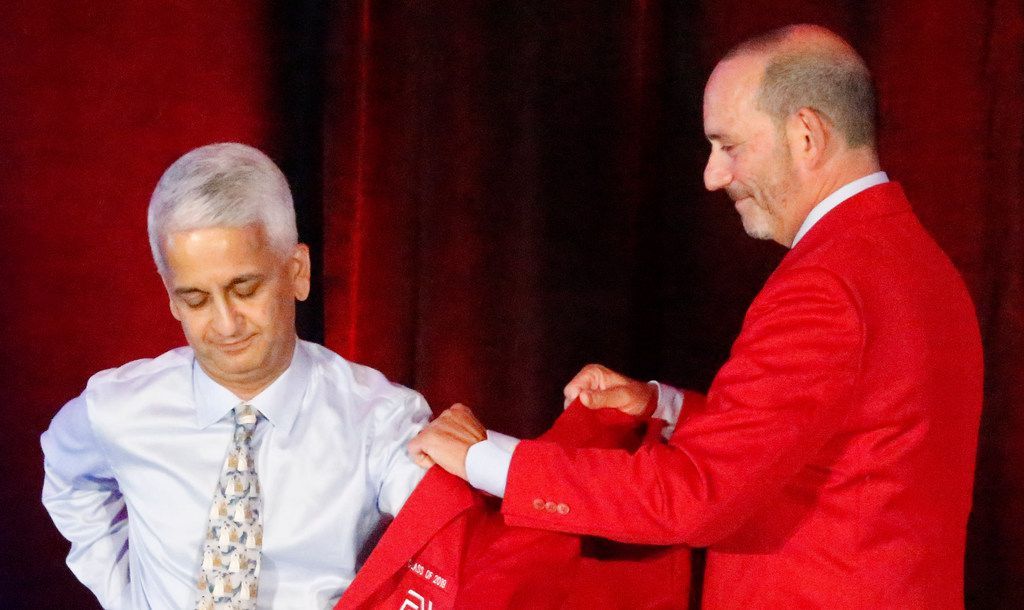 SportsDayDFW's tweet photo. @USWNT legend @AbbyWambach and  former @ussoccer president @sunilgulati get their red jackets at @soccerhof induction. #NSHOF19 

Story by @mpgladstone13 :https://t.co/JYKK0RXmbP
More photos from Stewart F. House: https://t.co/Br8VeoZ8Qt https://t.co/sPIgfZI5FT