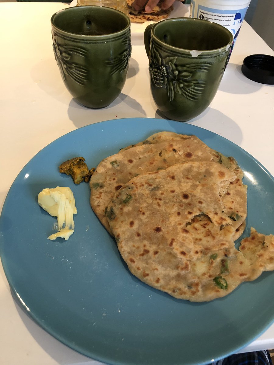 rituparnag's tweet photo. Rainy Sunday mornings with some sizzling hot paranthe and Ek cup chai! Aah the joy! #alooparanthe #SundayMotivation #lazysunday https://t.co/E8jobTFlQI