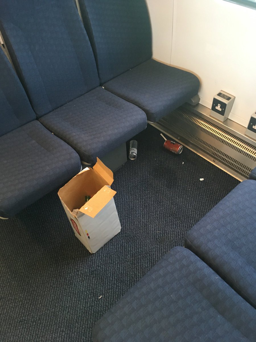Mimarail's tweet photo. @SW_Help awful mess on the 9:05 train from Guildford to London Waterloo this morning, and this was one of the cleaner carriages. https://t.co/yyW2whXdey