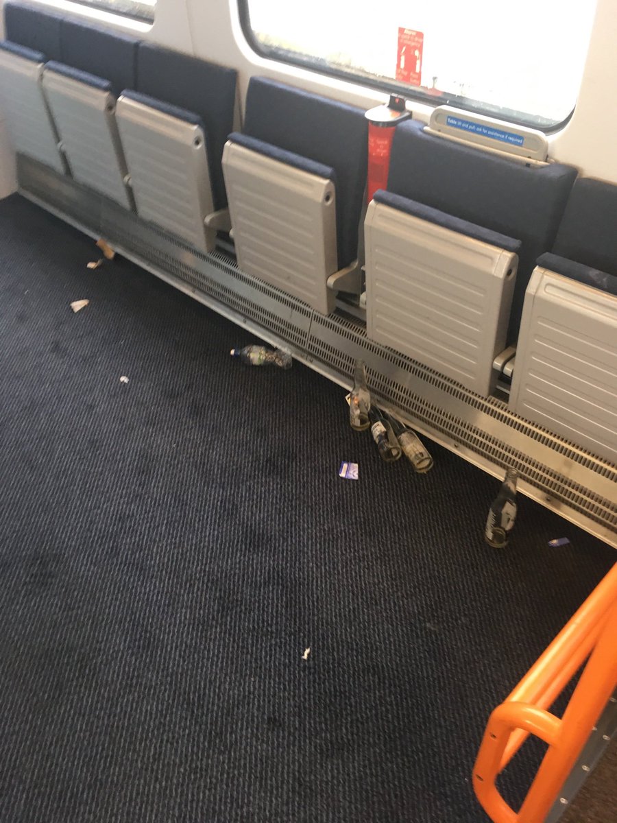 Mimarail's tweet photo. @SW_Help awful mess on the 9:05 train from Guildford to London Waterloo this morning, and this was one of the cleaner carriages. https://t.co/yyW2whXdey