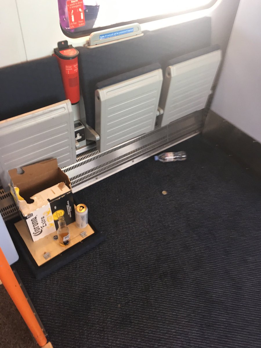 Mimarail's tweet photo. @SW_Help awful mess on the 9:05 train from Guildford to London Waterloo this morning, and this was one of the cleaner carriages. https://t.co/yyW2whXdey