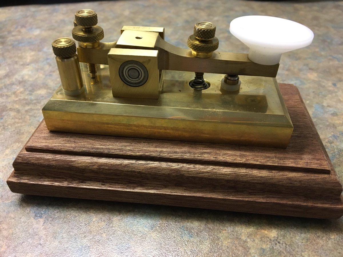 G4SGI's tweet photo. Just finished mounting this brass key onto a mahogany baes. Got it square this time. #hamr #hamradio https://t.co/a9H3JTVSuo