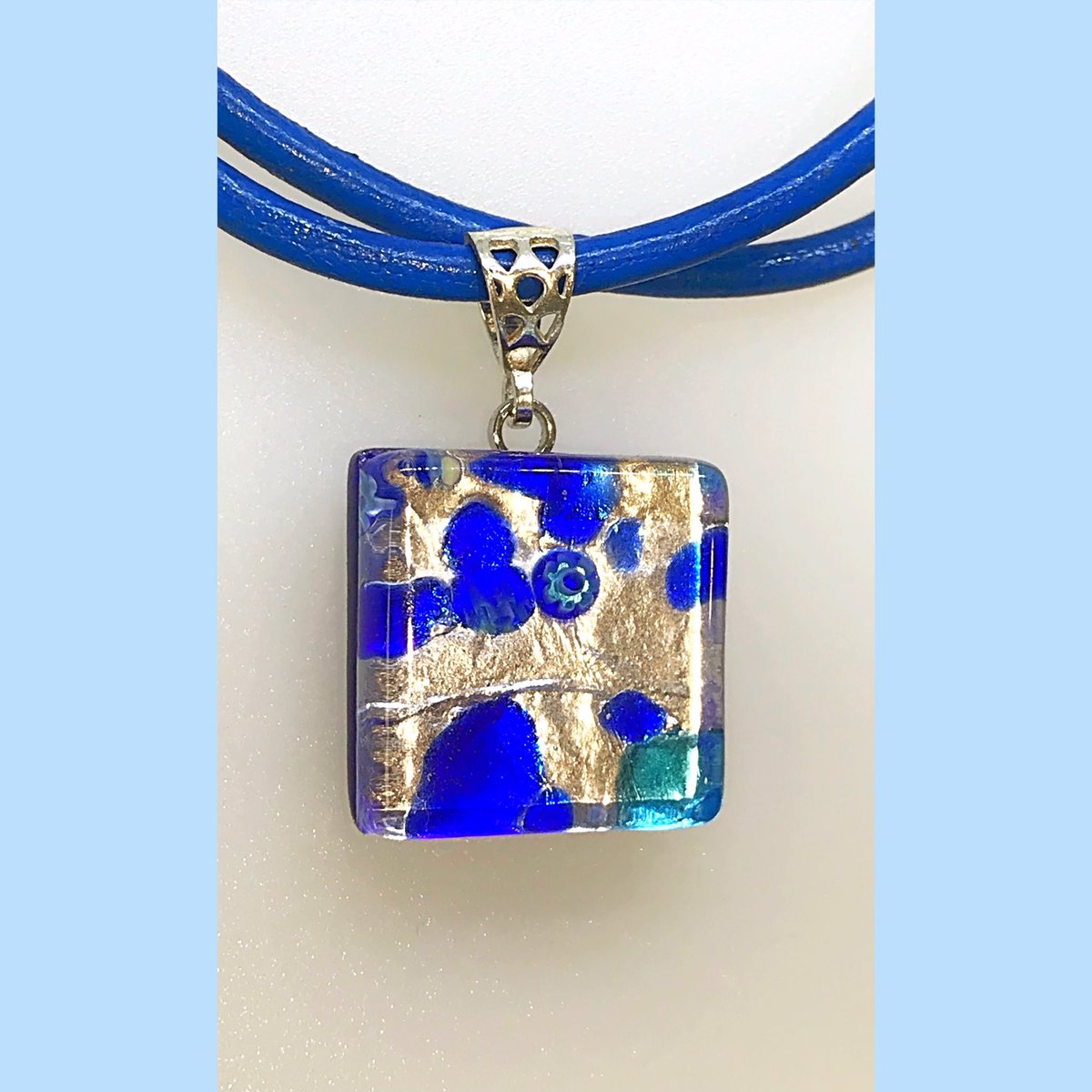 Murano Glass Pendant with Blue Leather Chain and Sterling Silver Findings.
marjancreations.com
#muranonecklace #bluenecklace #bluemuranopendant #marjancreations
