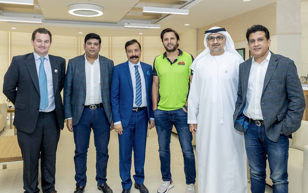 T10League's tweet photo. Lahore Qalandars join Abu Dhabi T10 for 2019 season, announcing Shahid Afridi as their Icon Player. Qalandars ownership and Afridi today met with General Secretary of Abu Dhabi Sports Council, H.E. Aref Al Awani for a press event to announce their participation! #AbuDhabiT10 #t10 https://t.co/9cEIMbpbCc