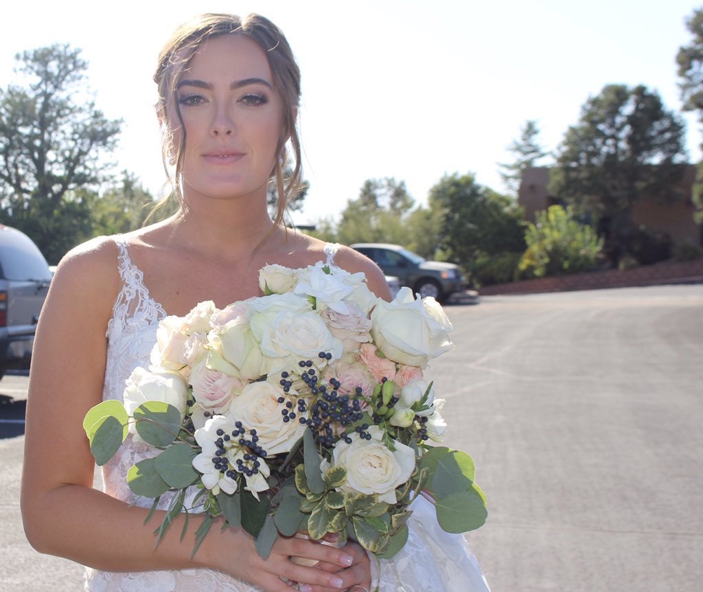 Beautiful woman, beautiful flowers. #Sedonawedding