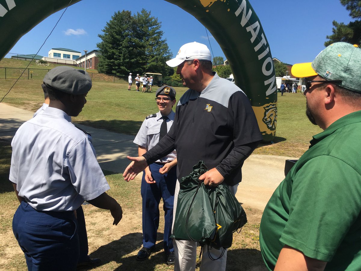 LaMontaCaldwell's tweet photo. Westover JROTC Color Guard receiving SwagBags from Methodist University AD and Hanging out with Methodist University President after presenting Colors for MSU football game yesterday at MSU campus ⁦@WestoverHS⁩ https://t.co/VTxc7TwRft