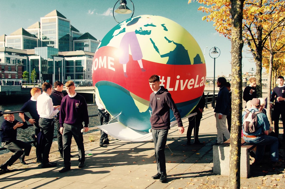 Janemellett's tweet photo. I πthis picture, taken by my friend Clara, at #GlobalClimateStrike. @Belvederecolleg students carrying the @RedComsIreland #LiveLaudatoSi Globe. Friday, people of all faiths &none came together 2show solidarity w/young people fighting 4 #climatejustice. #FaithsForClimateAction https://t.co/hp40hbdzBo