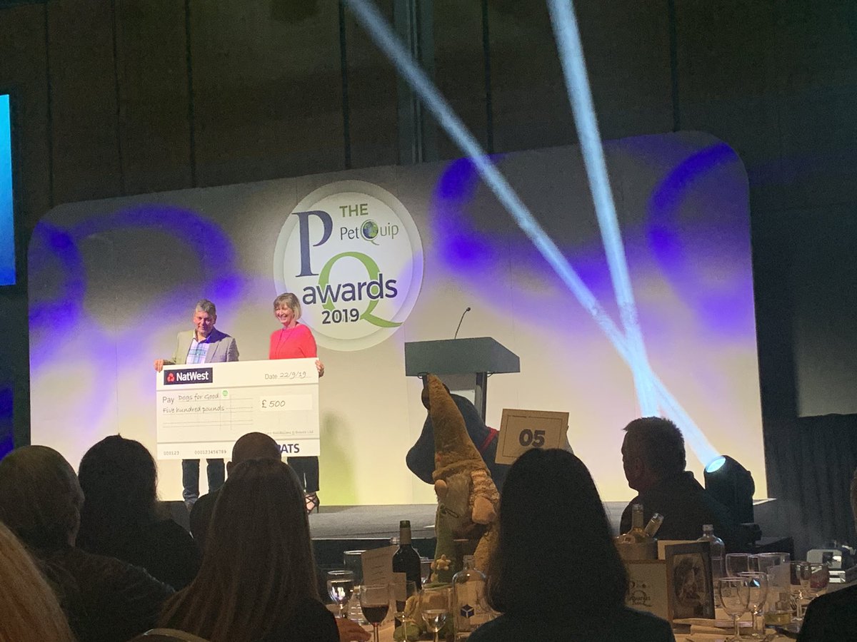 PATSTradeShow's tweet image. PATS charity @DogsForGoodUK receiving  a cheque at the #PATS19 New Product Awards - hopefully the evening will raise even more for this fantastic cause.