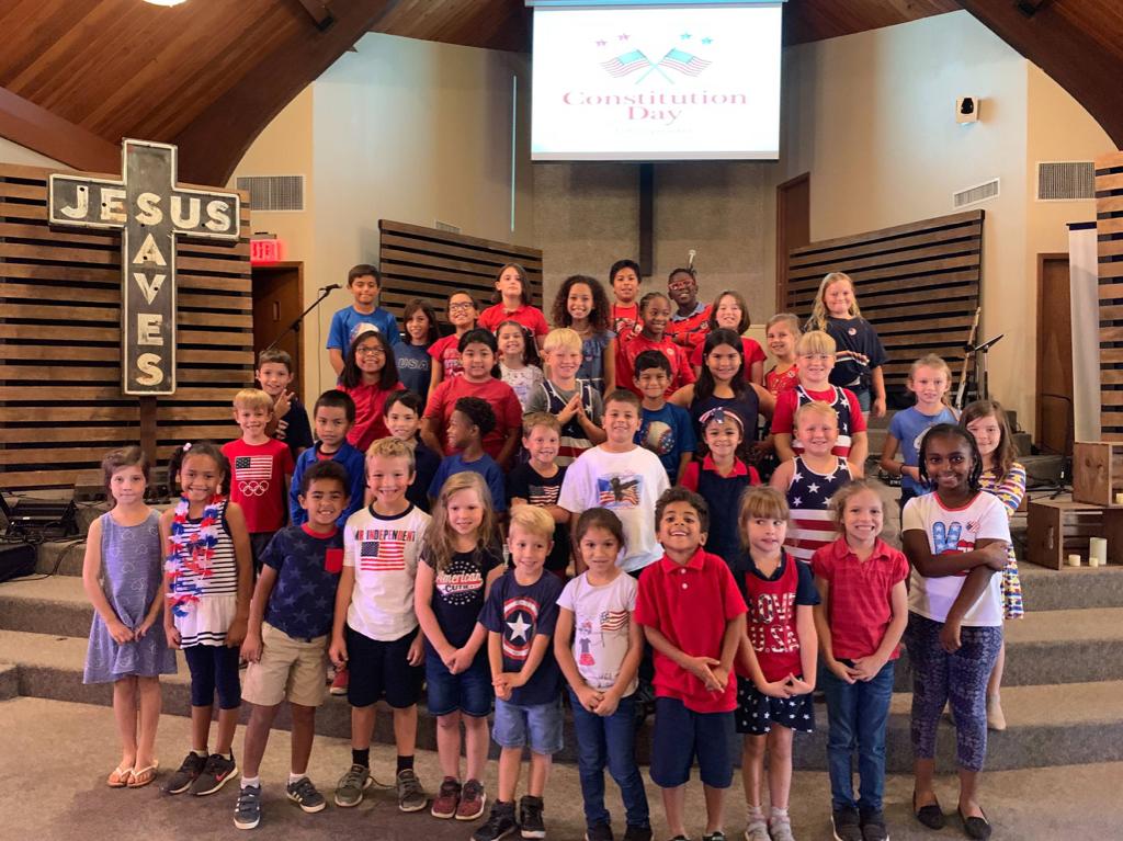 PC_Cougars's tweet photo. Phoenix Christian Preparatory Elementary  students ending this week having learned about our Constitution, and a grande demonstration of love for our country! https://t.co/ByiVDfpEpx