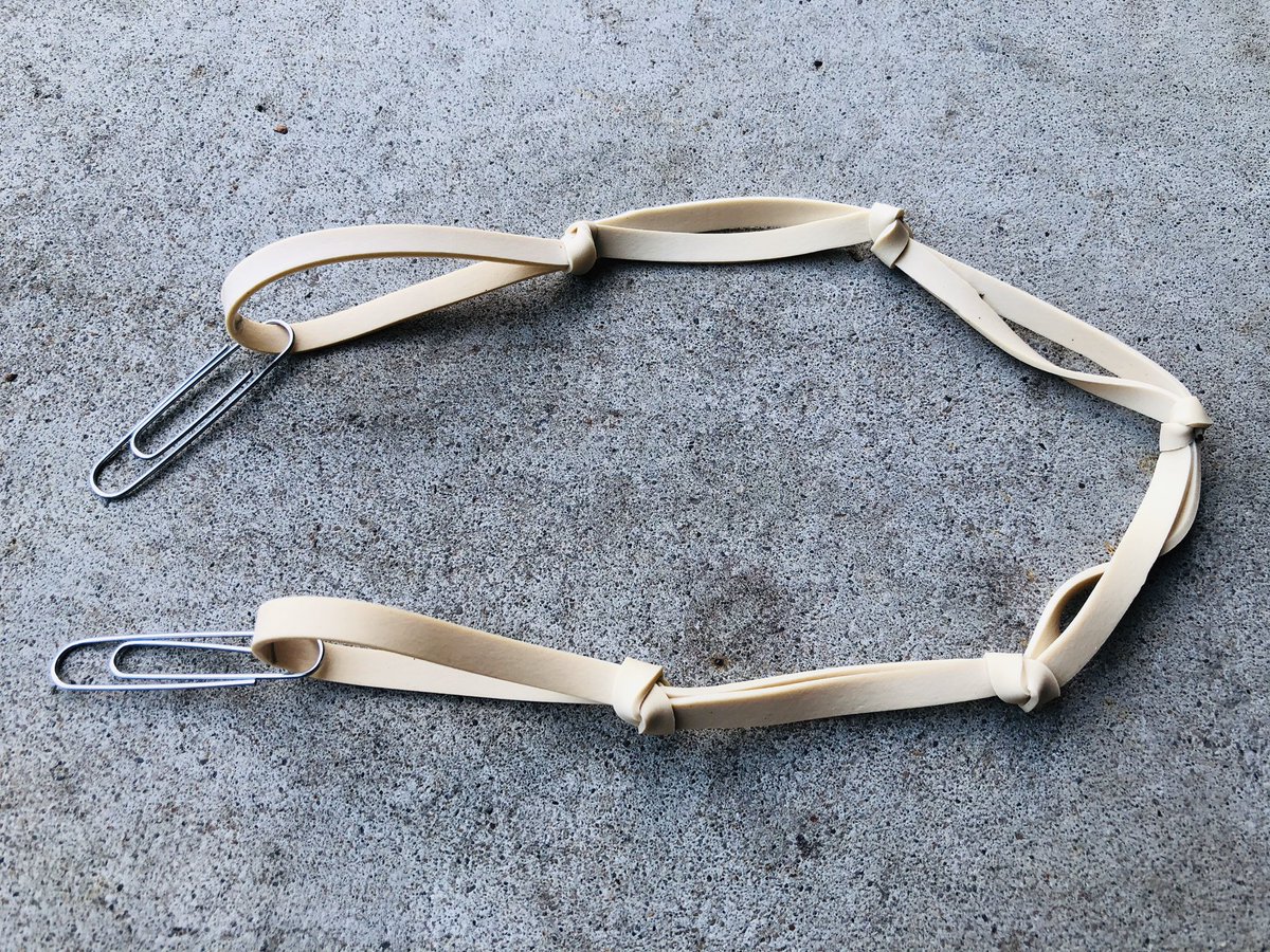 signprotest's tweet photo. Low cost sign bungee cord alternative ➡️ Rubber bands + paper clips. Push paperclip over chain link, stretch and repeat. #Resistance #ResistMore #ImpeachKavanaugh #Impeach45 https://t.co/Q3WQmoEI14