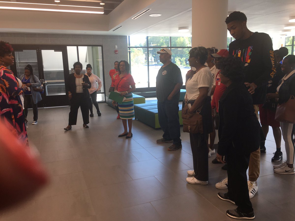 The community tours Weaver. Several alumni were joined the tours. Excited about the re-opening.