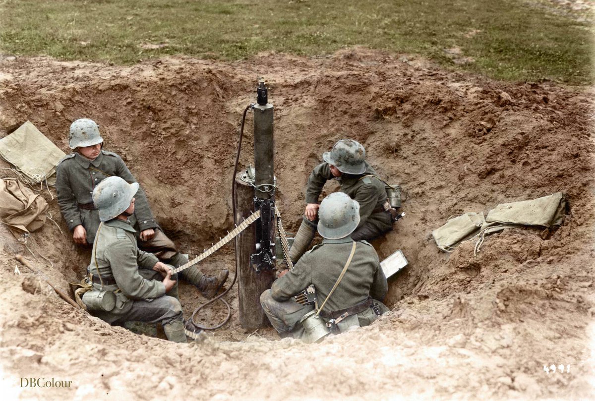 German MG 08 anti-aircraft machine gun post set up in a shell hole.  Flanders Front, September 1917