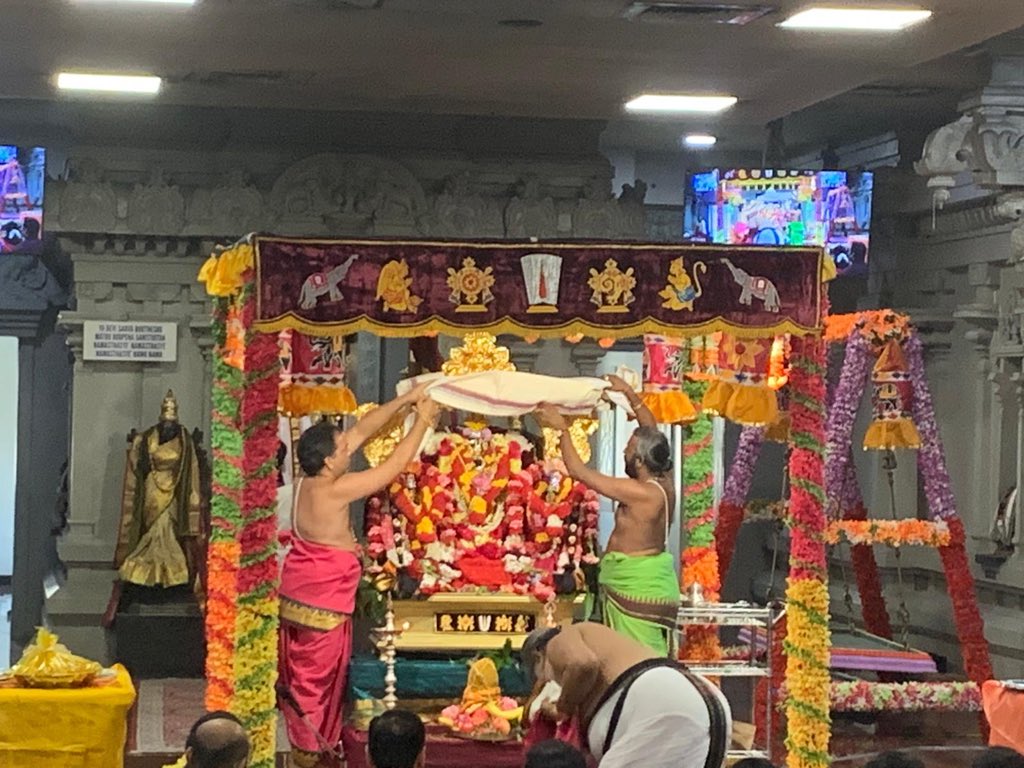 Sidelines of  #HowdyModi Lucky for us, at Meenakshi temple in Houston, Sri Sreenivasa Kalyanam was being performed. Offered Saree& Dhoti set to Srivaru &Ammavaru. Temple has this beautiful Rath 