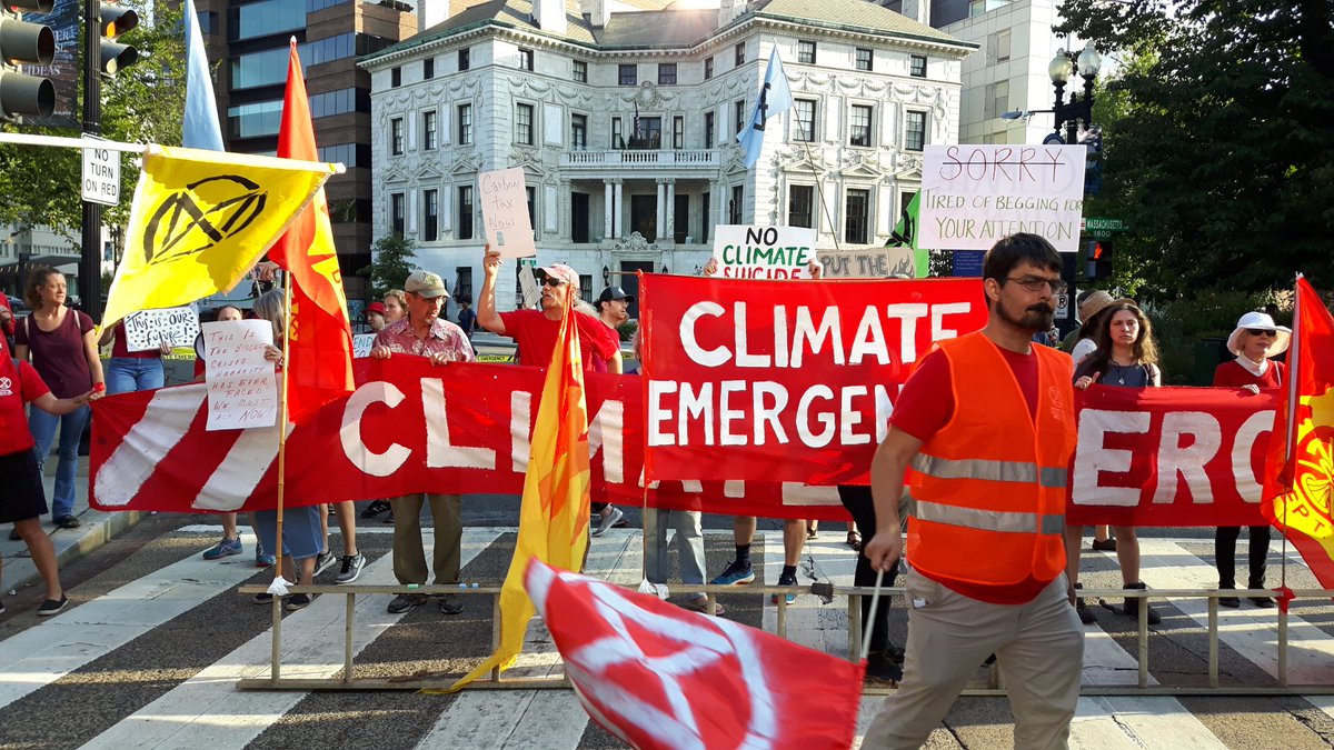 CJAOurPower's tweet photo. #ClimateStrike blockades all over DC this morning. #ShutdownDC system change not climate change https://t.co/hGxdGchOrT