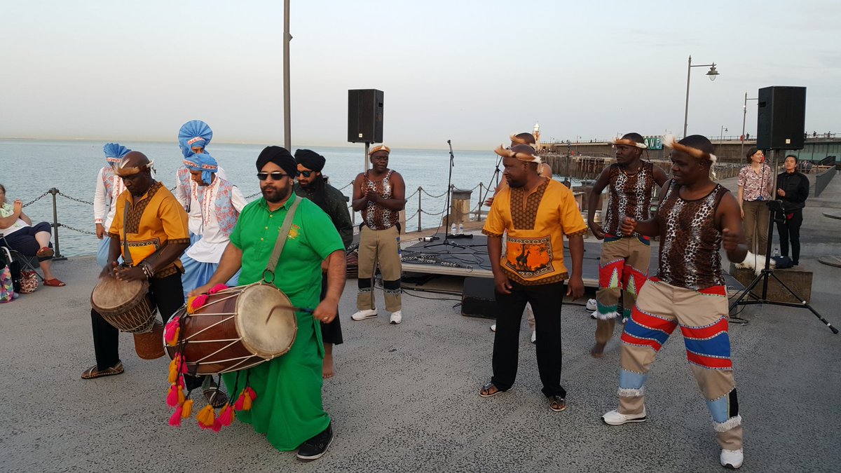 music4changeuk's tweet photo. What a way to finish our big sounds programme with Afro Bhangra fusion at Folkestone Harbour Arm on Saturday @FstoneHbourArm @cohesionplus @4x4Bhangra @KingsofDhol @luMoyo #folkestone #folkestoneharbourarm #musicforchange #cohesionplus #afrobhangrafusion #afrobhangra #uzambezi https://t.co/V9vw5lr2LP