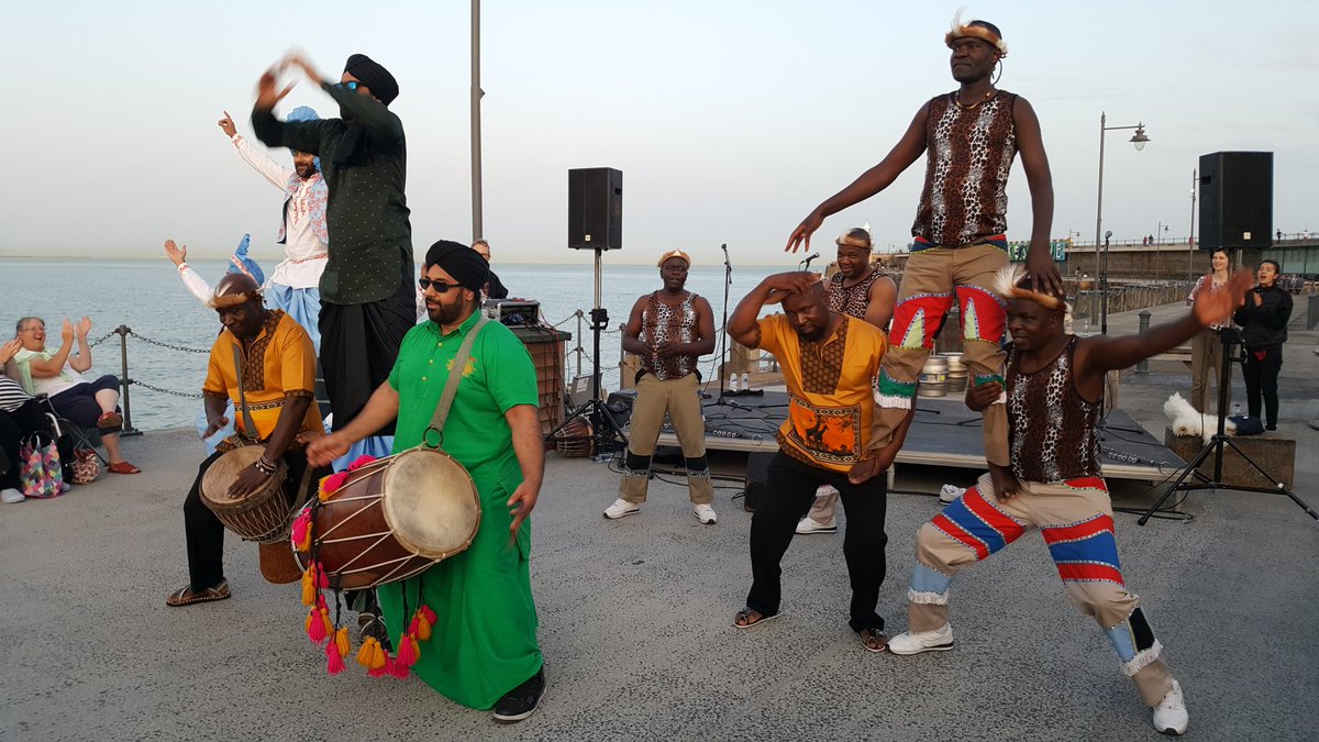 music4changeuk's tweet photo. What a way to finish our big sounds programme with Afro Bhangra fusion at Folkestone Harbour Arm on Saturday @FstoneHbourArm @cohesionplus @4x4Bhangra @KingsofDhol @luMoyo #folkestone #folkestoneharbourarm #musicforchange #cohesionplus #afrobhangrafusion #afrobhangra #uzambezi https://t.co/V9vw5lr2LP