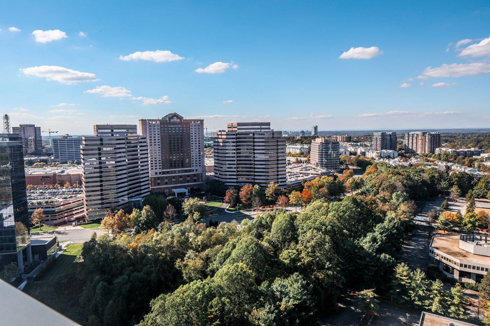 Happy First Day of Autumn! We’re already starting to see some fall foliage across Tysons from above.