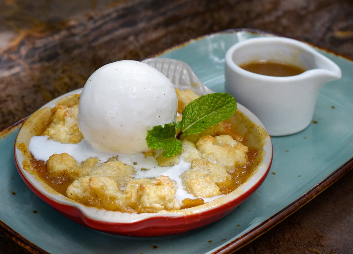 Have a sweet start to your week with our warm peach and prosecco cobbler.