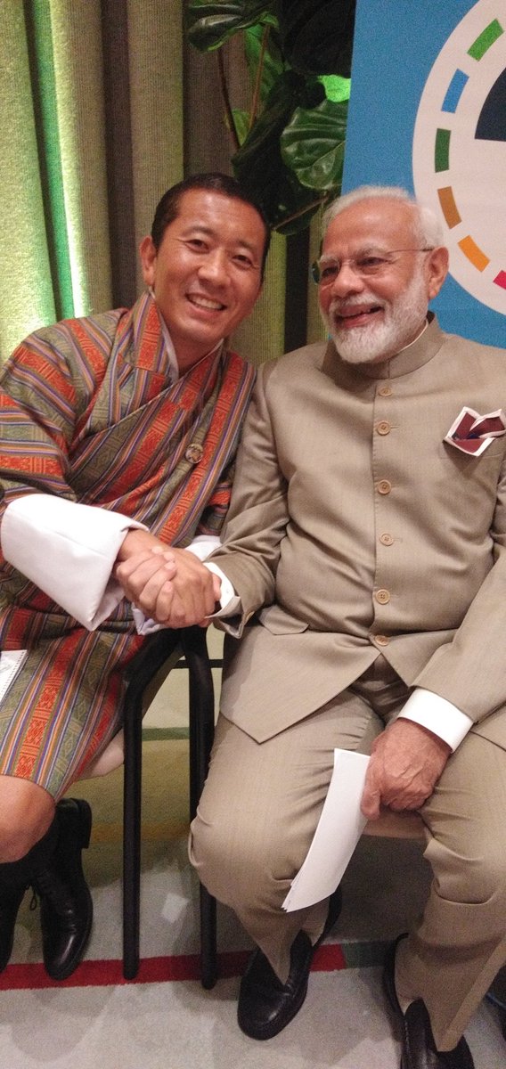 PMBhutan's tweet image. And we bump into our dear friend @narendramodi as we wait for our turns to speak at the @UHC2030
