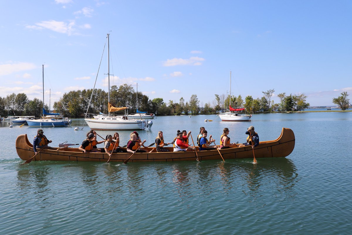 AlgomaU's tweet photo. Canoe believe it? As part of Anishinaabe Welcome Week, our students had the opportunity to paddle the St. Mary's River and learn from the land and water. We even enjoyed some cedar tea! Thank you @LSWConservancy #Bawaating #landbasededucation #algomau https://t.co/5e7T3LIdaR