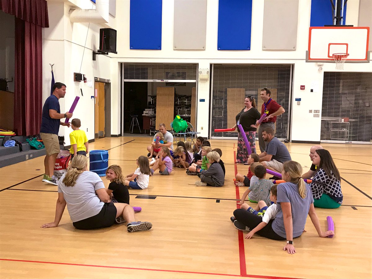 Mr. Brown explaining the rules of turtle tag to some of our kindergarten students and their parents. Thank you to all our parents who participated today! We hope the rest of you will join us later this week! <a href="/pe_ces/">CES PE</a> <a href="/OneRCPSchools/">Rockbridge County Public Schools</a>
