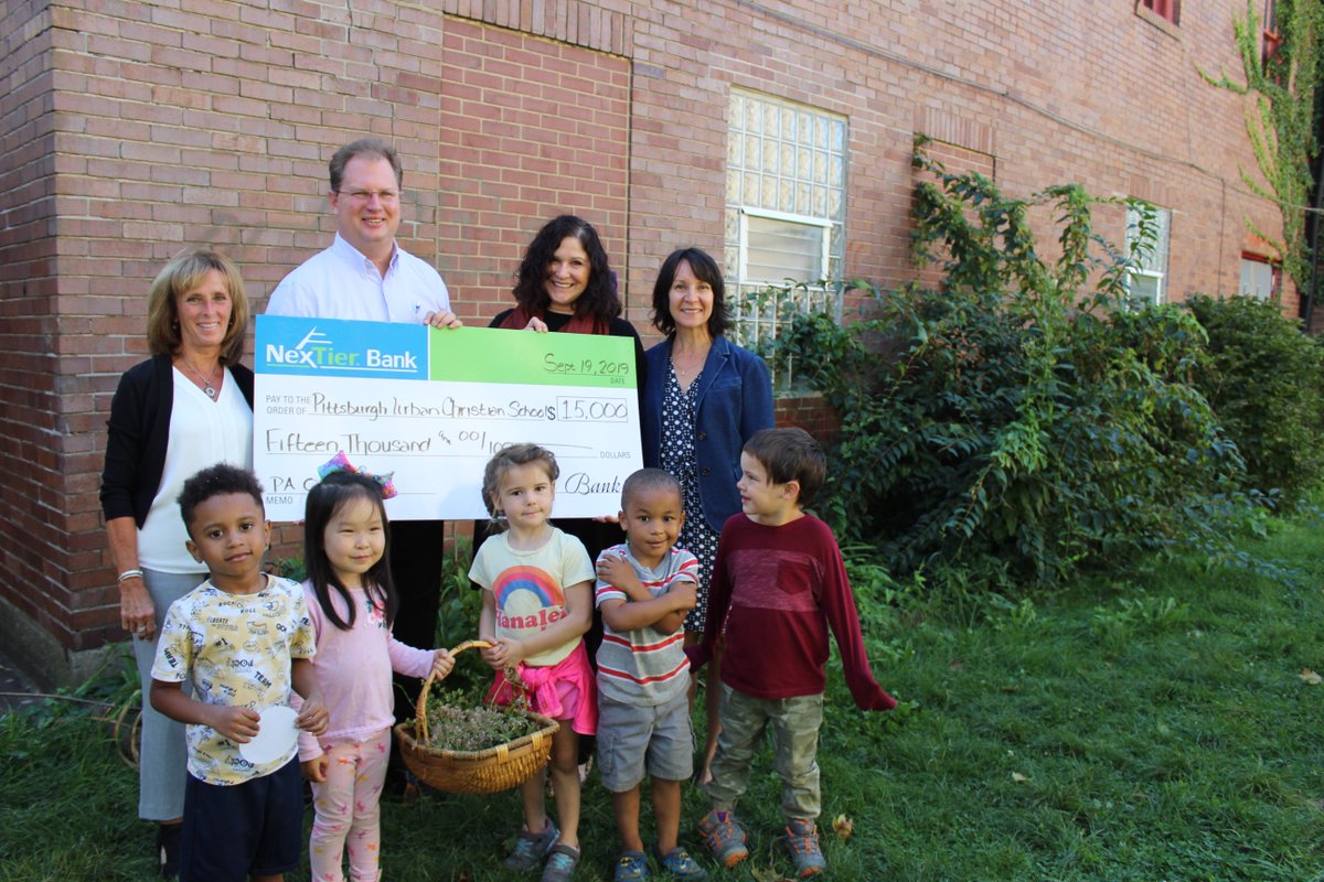 NexTier's tweet photo. Our #travelingcheck loves to visit our local schools. On September 19th it made it's way to the Pittsburgh Urban Christian School. We were so excited for them to show us their beautiful new building -- and so excited to meet their 1st preschool class ever! #nextiergivesback https://t.co/oKqx0XrTz6